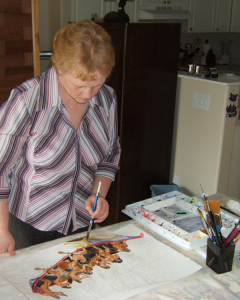 Jocelyn Reekie, with an illustration for one of her books in process.