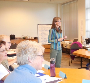 When you're speaking to a specific audience you must consider their interests and background to deliver your message. (Seen here: Annette Yourk, teaching a writing class.)